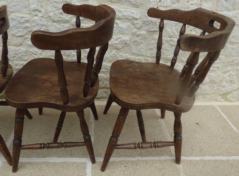 4 solid wood western-style "smoker's chairs" made of oak