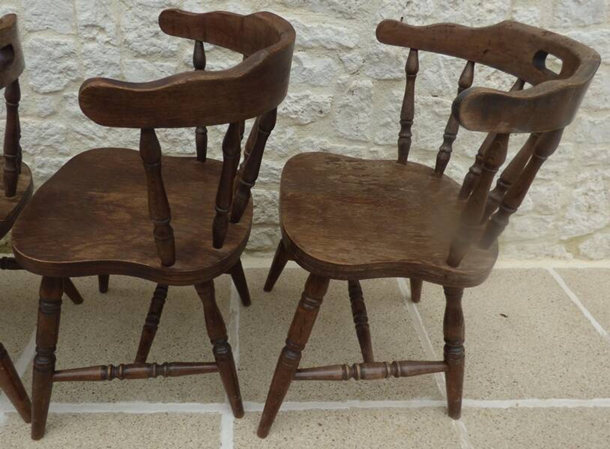 4 solid wood chairs in western style called "smockers chairs", in oak.