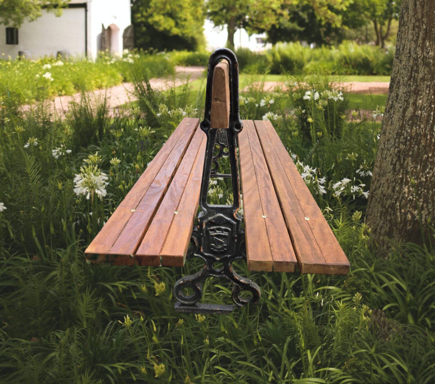 Antique double garden bench from the city of Paris in cast iron and wood