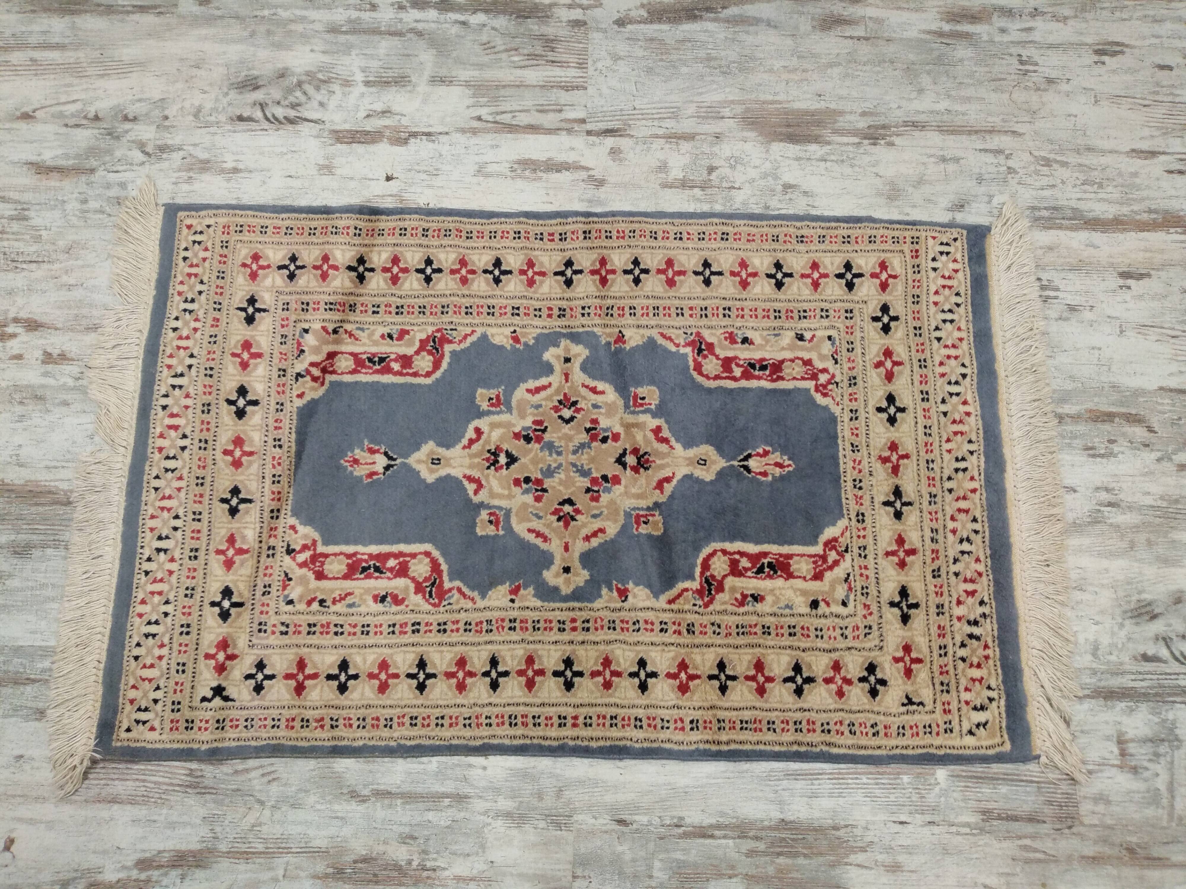 Handmade wool and silk Persian rug