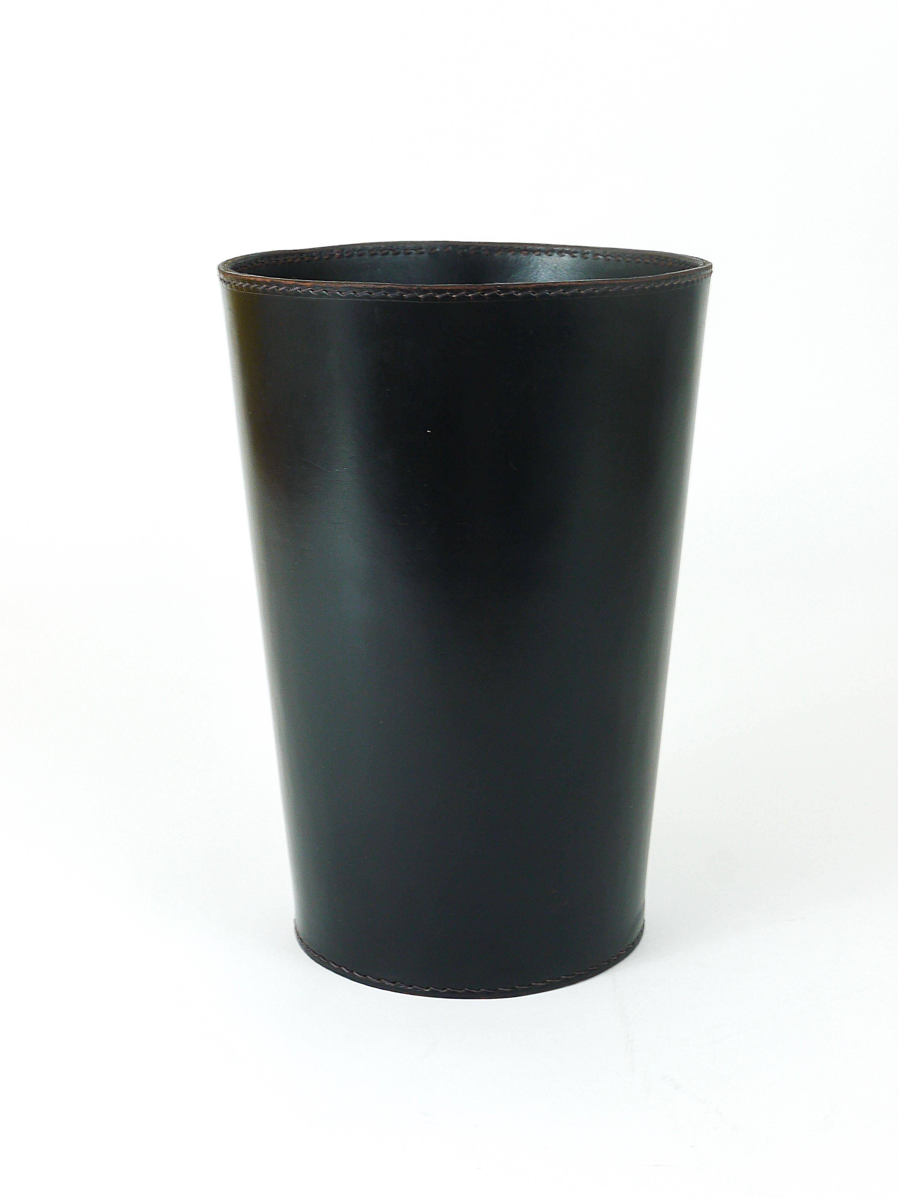 Mid-Century paper bin by Carl Auböck in black leather and brass, Austria, 1950s.