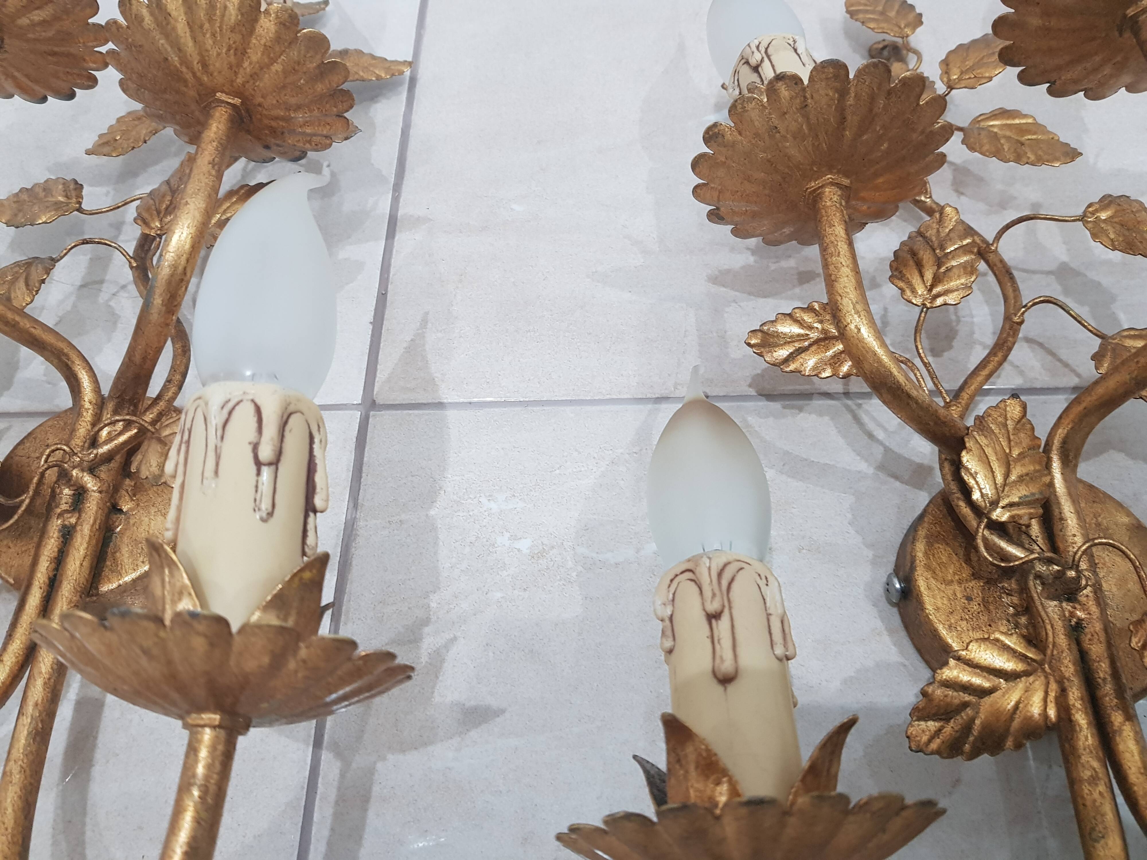 A pair of wall lamps / Coco Chanel / Hollywood Regency / France, 1960s