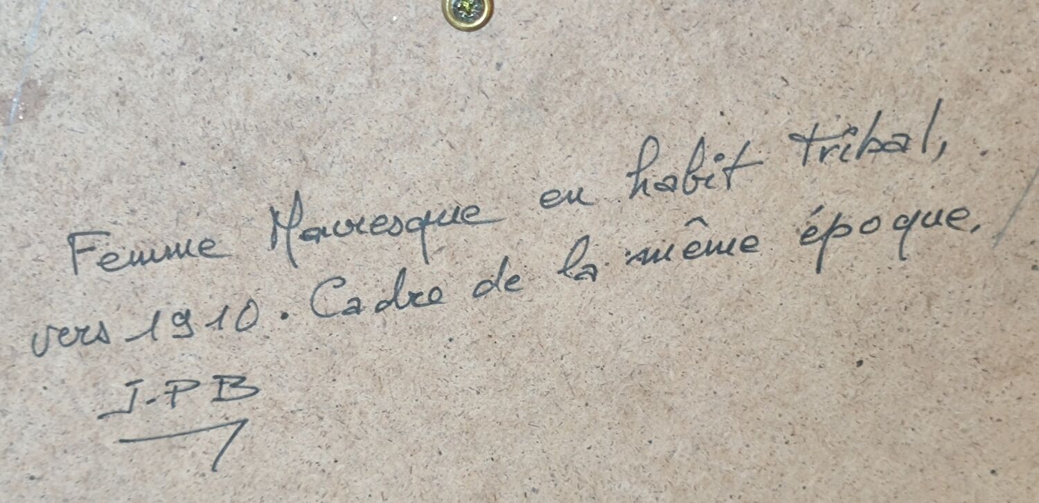 Old wooden frame and bronze ornament