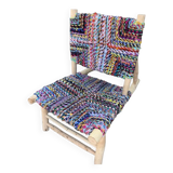 Wooden armchair braiding multicolored fabrics