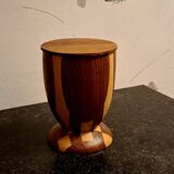 Bookends in exotic wood marquetry in the shape of a tambourine.