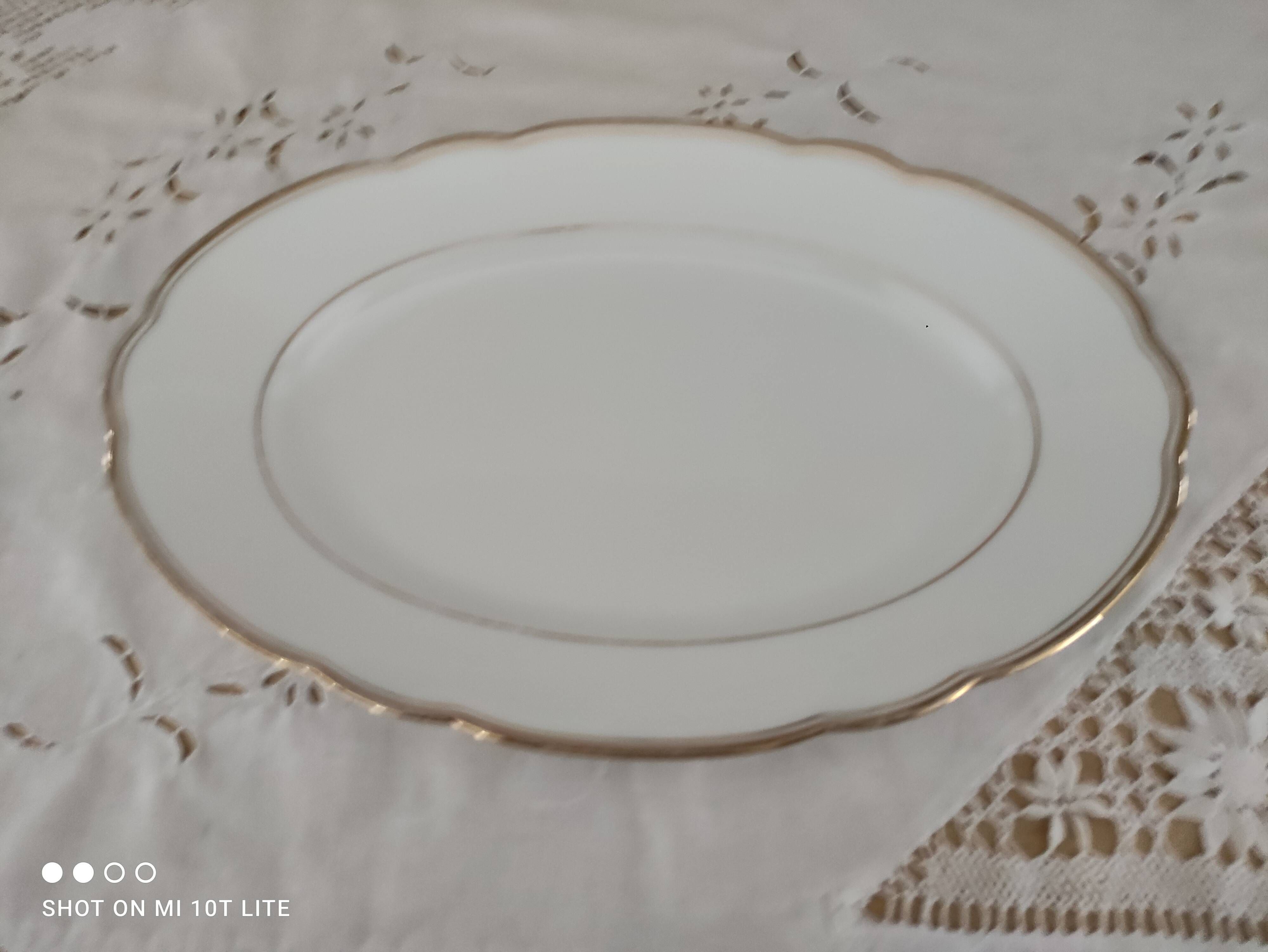 Oval plate in white Swiss porcelain double gilded border "VSK USC Viribus Unitis"