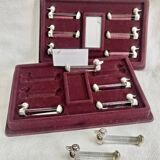 12 silver-plated metal duck knife rests with crystal.