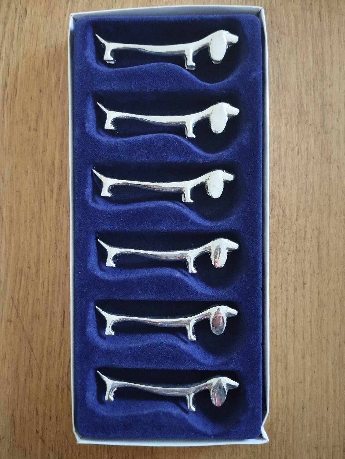 Silver metal dog knife holder