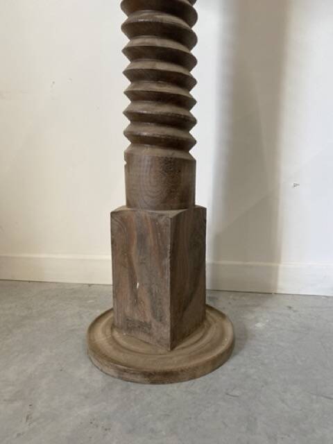 Old wooden press screw, round base