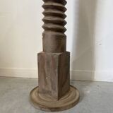 Old wooden press screw, round base