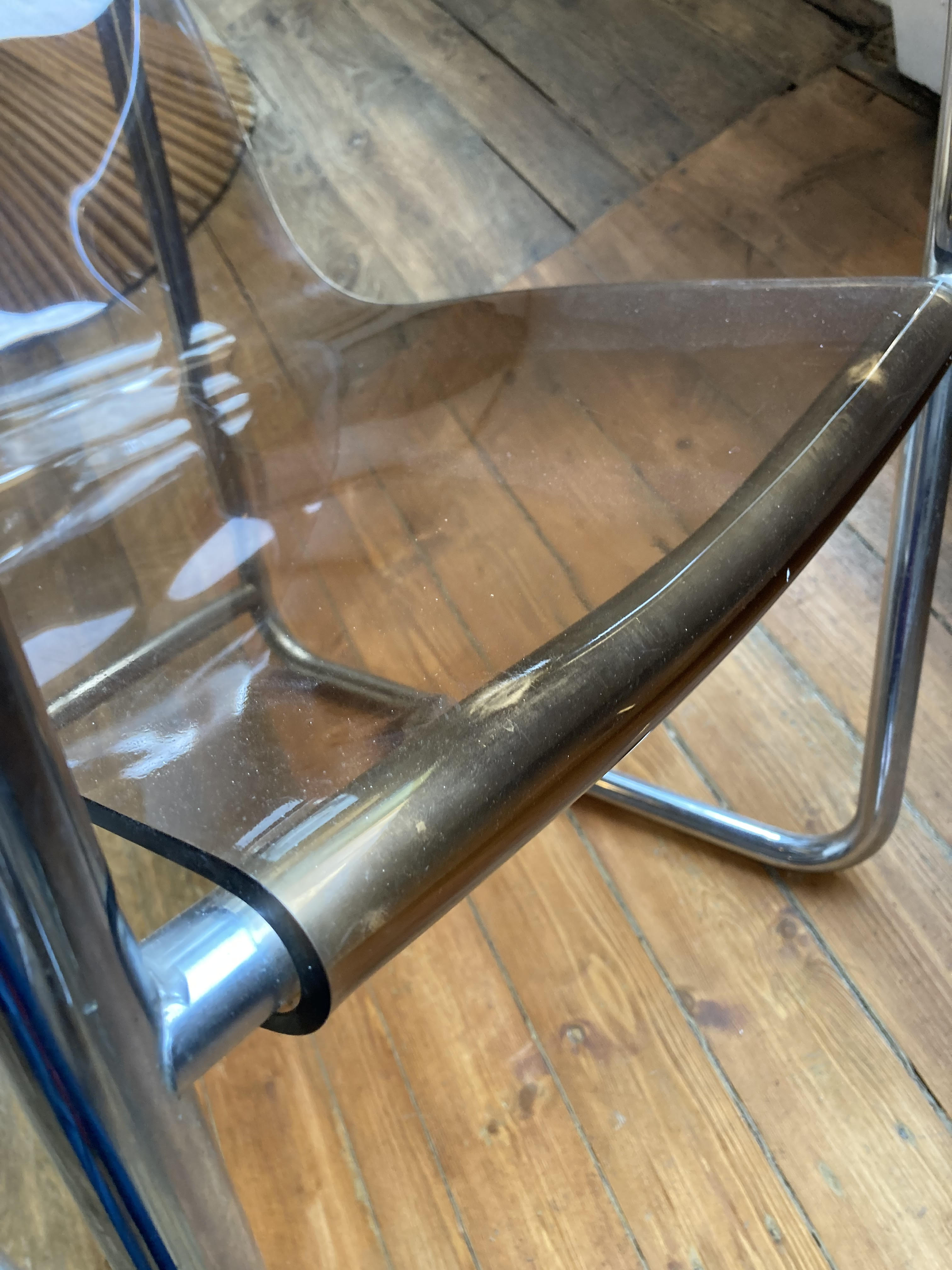 Armchair in chrome tubular metal and smoked plexiglass