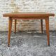 Oak table has two vintage extensions