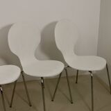 Set of 4 living room chairs in curved wood veneer and chrome base from the 70s.