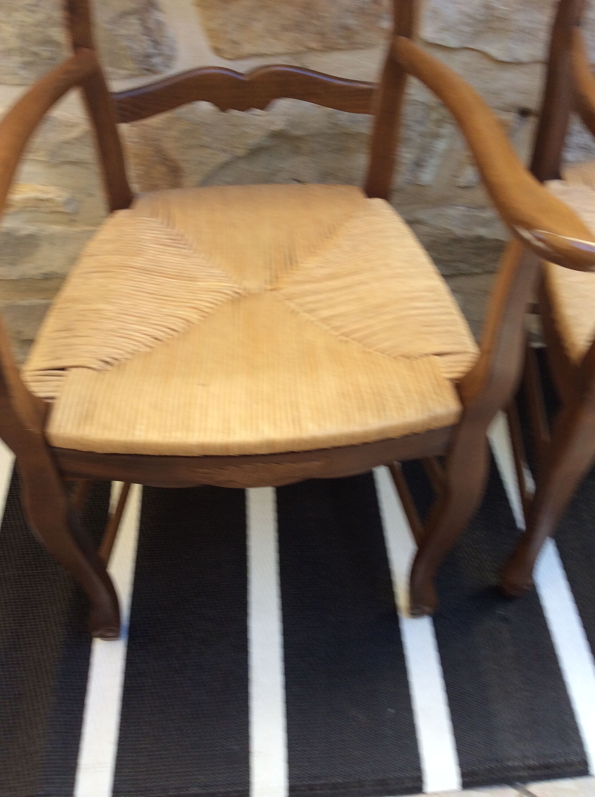 Pair of straw seating armchairs