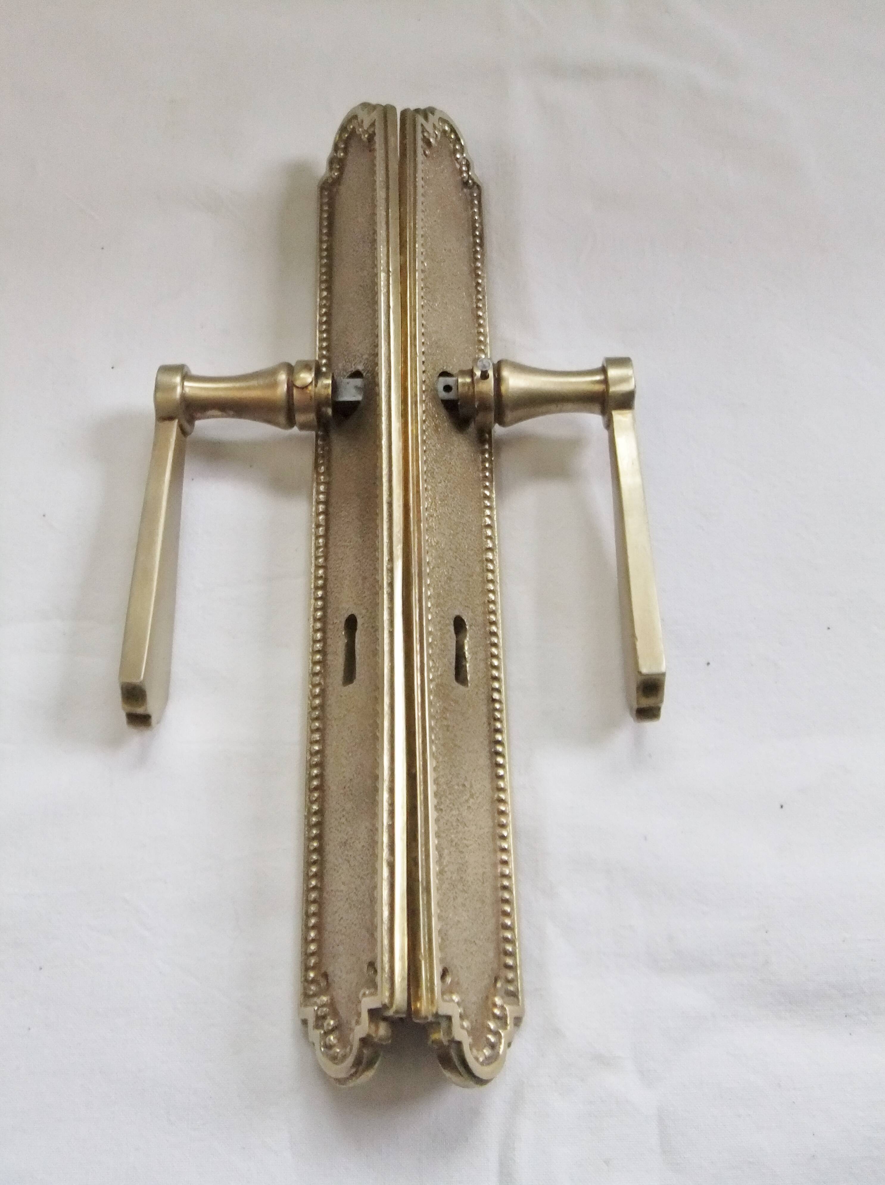 Pair of Louis XVI style beaded bronze door handles