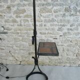 Wrought iron floor lamp with ceramic shelf herbarium decoration