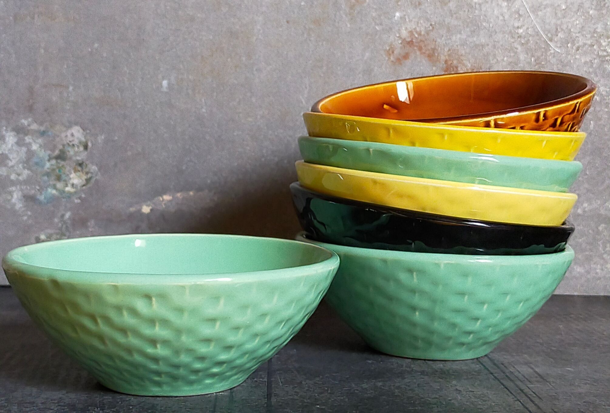 Seven vintage slip ceramic bowls