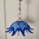 Vintage blue and white stylised flower pendant