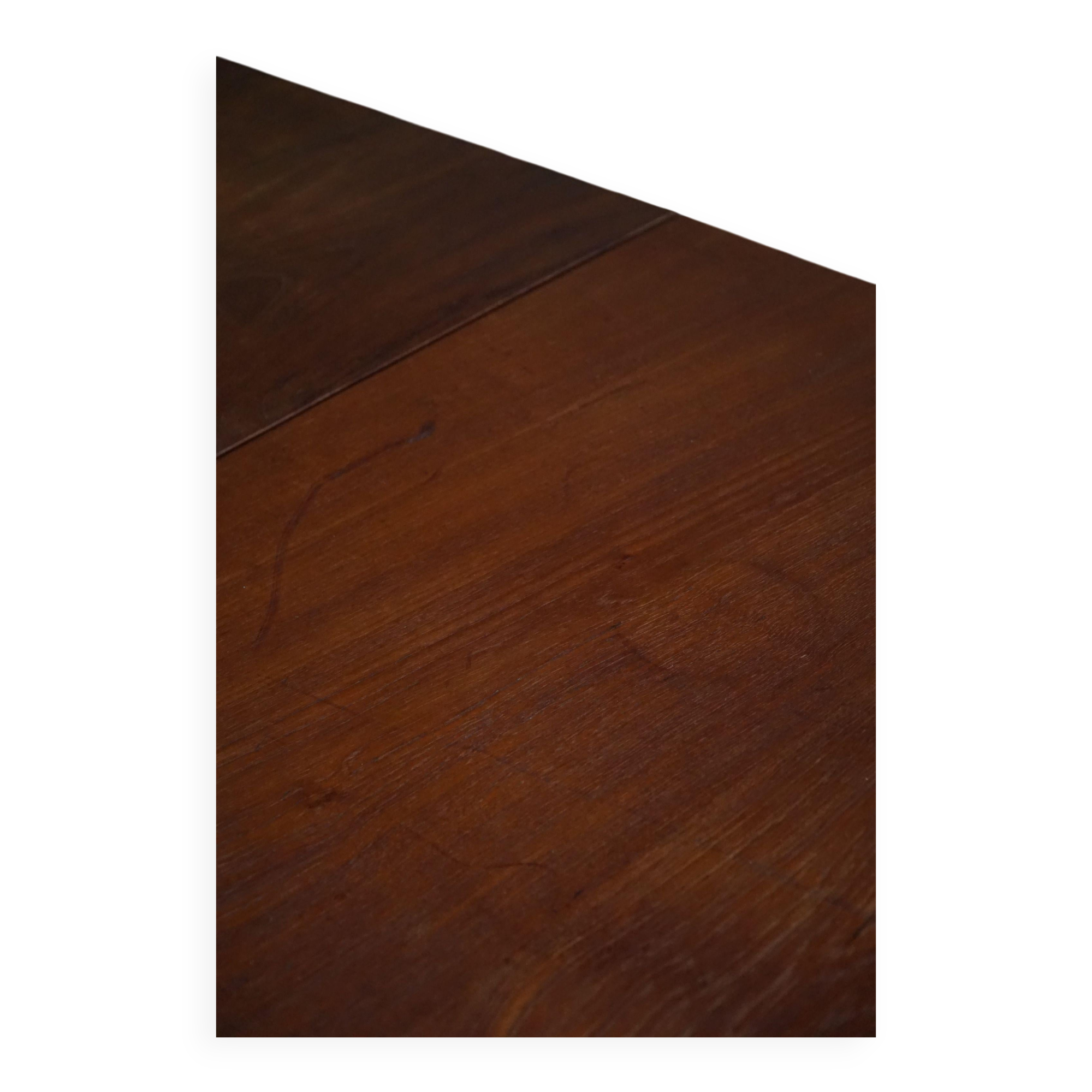 Art Deco dining table in teak, with butterfly extension, Danish cabinetmaker, 1940s.