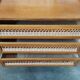 Commode vintage rotin pieds compas