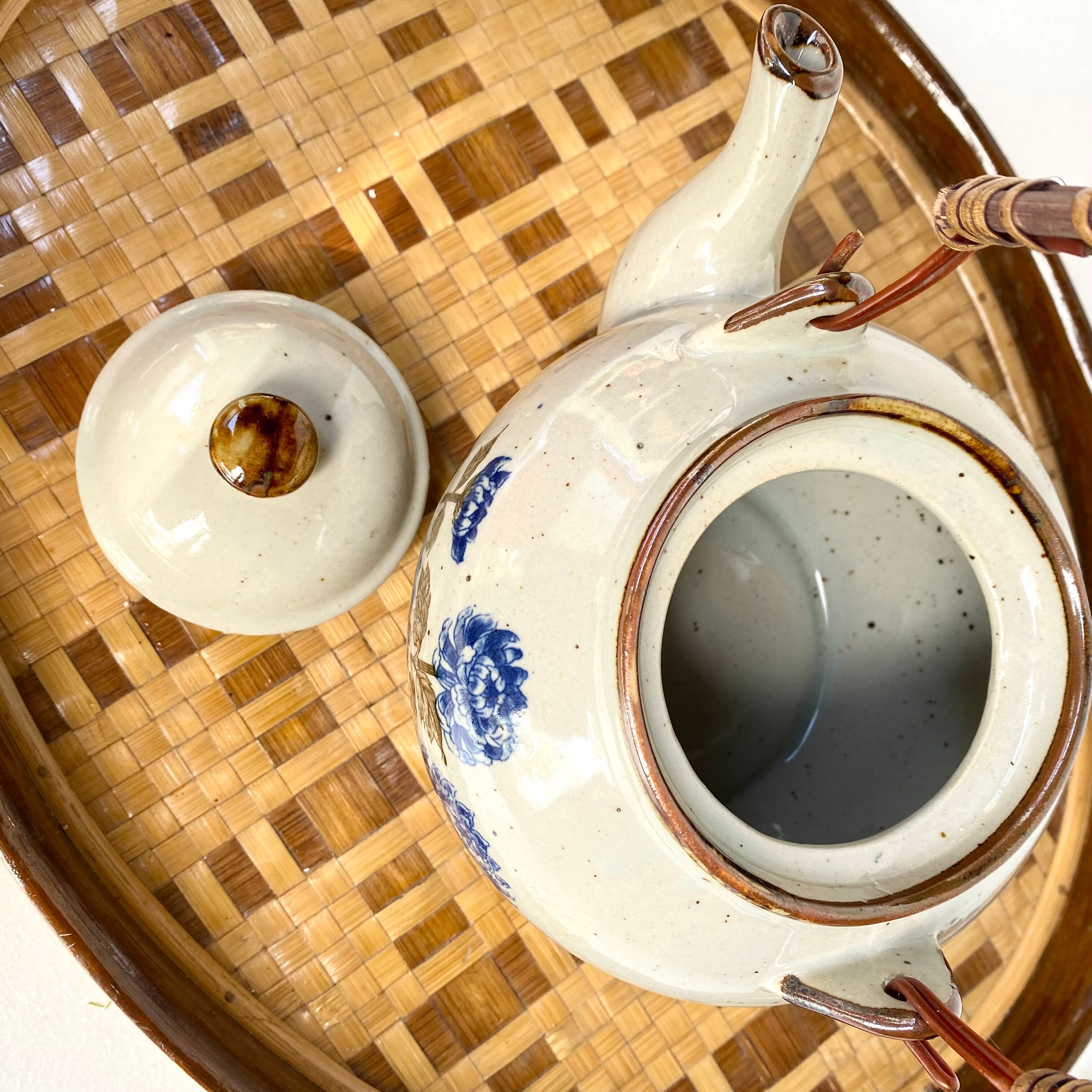 Vintage sandstone teapot wicker handle