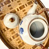 Vintage sandstone teapot wicker handle