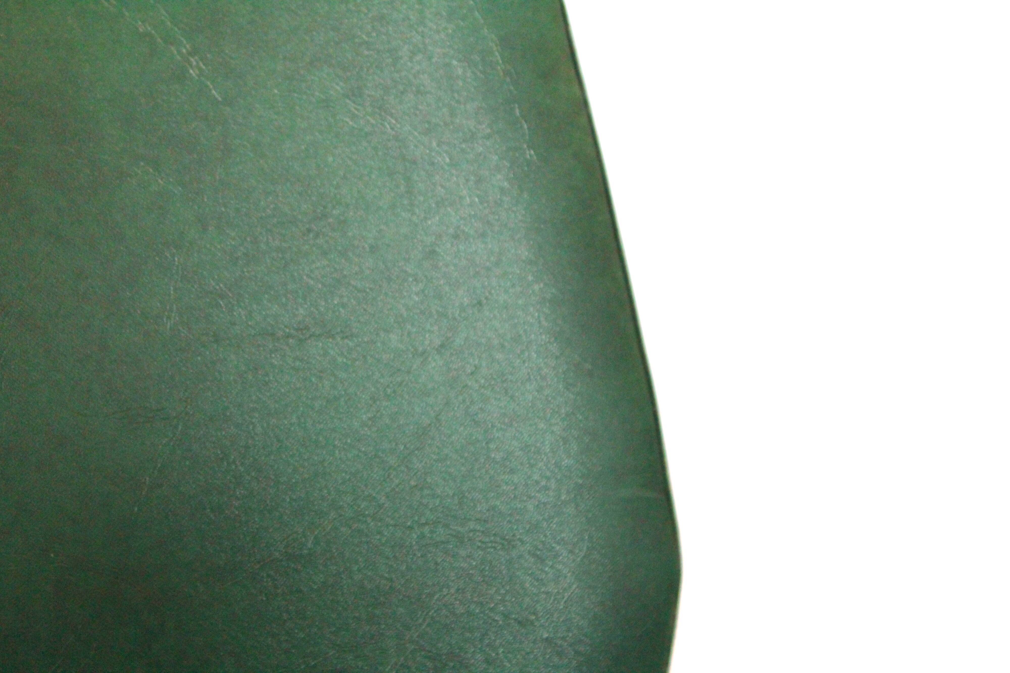 Set of 4 vintage chairs wood and skai green