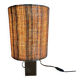 Small modernist table lamp with hand-woven shade.