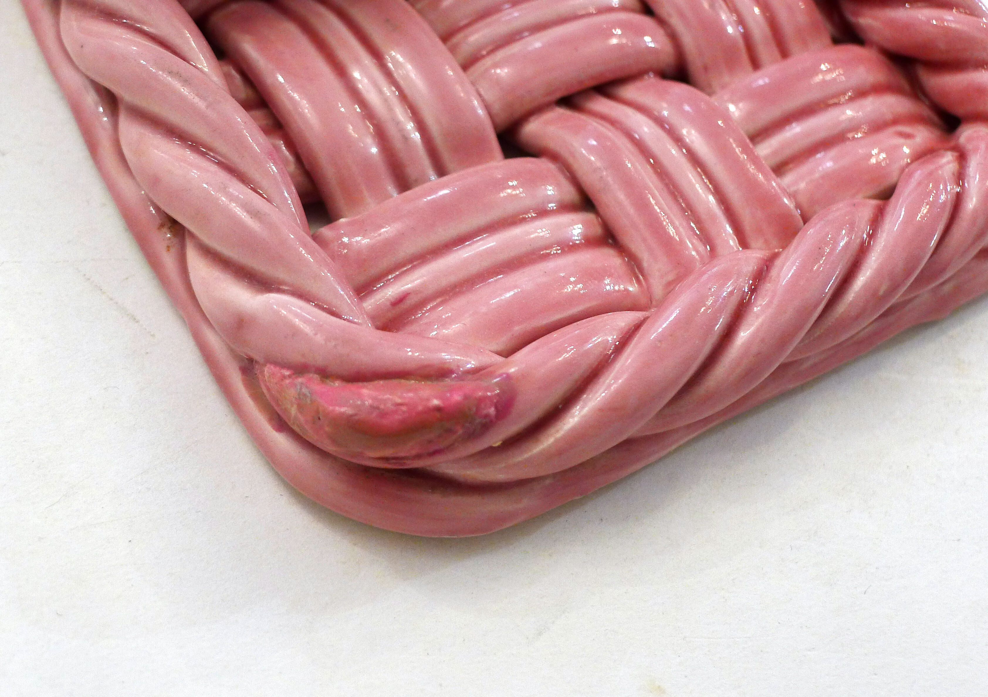 Woven pair of bottle coasters, in pink Vallauris earthenware.