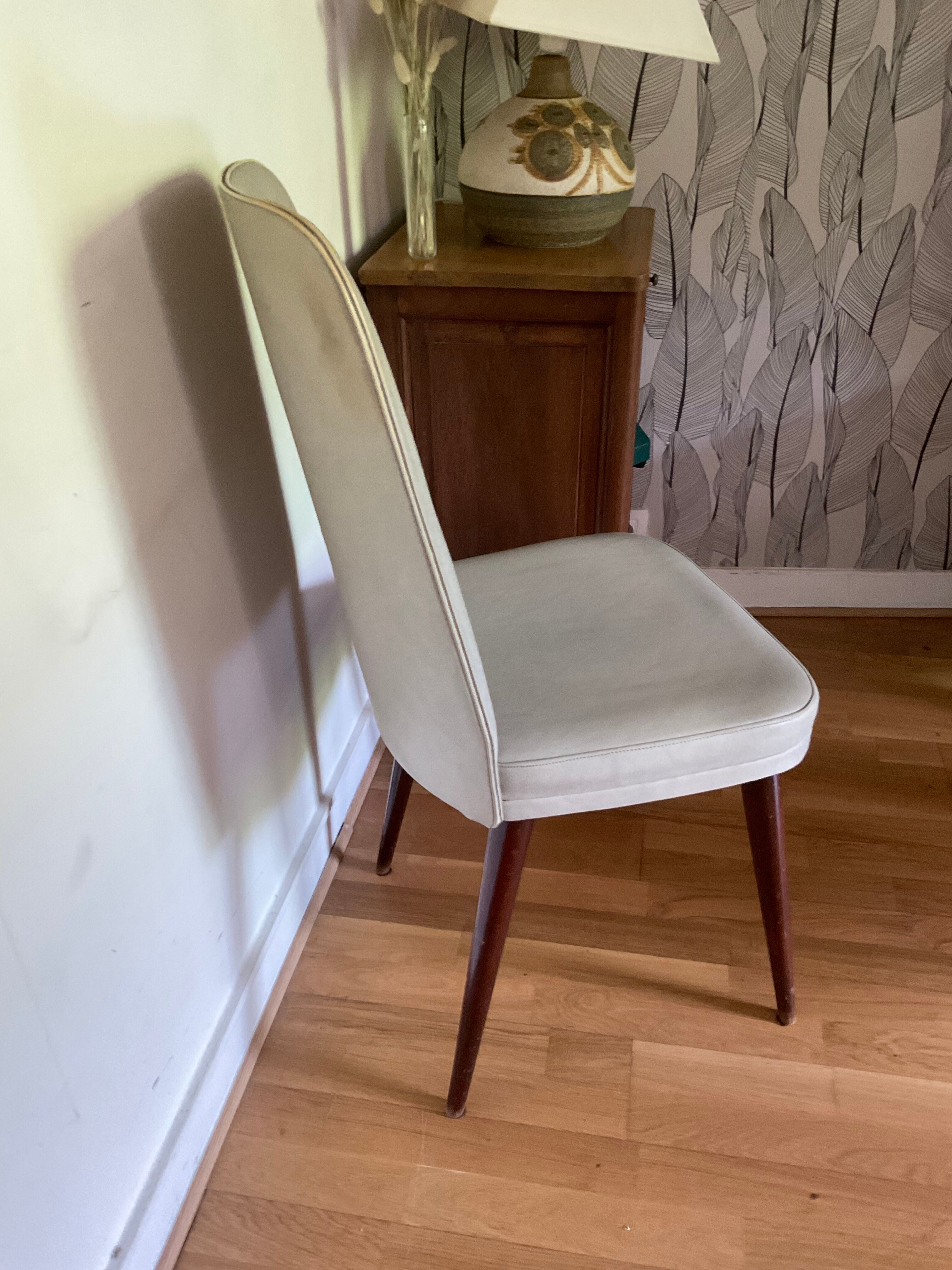 Pair of vintage mahogany and skai chairs