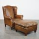 Sheepskin wing chair + XXL patinated footrest