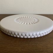 Pierre Motton glazed earthenware scalloped trivet for Gien