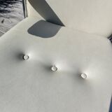 Paire de fauteuils pivotants simili crème