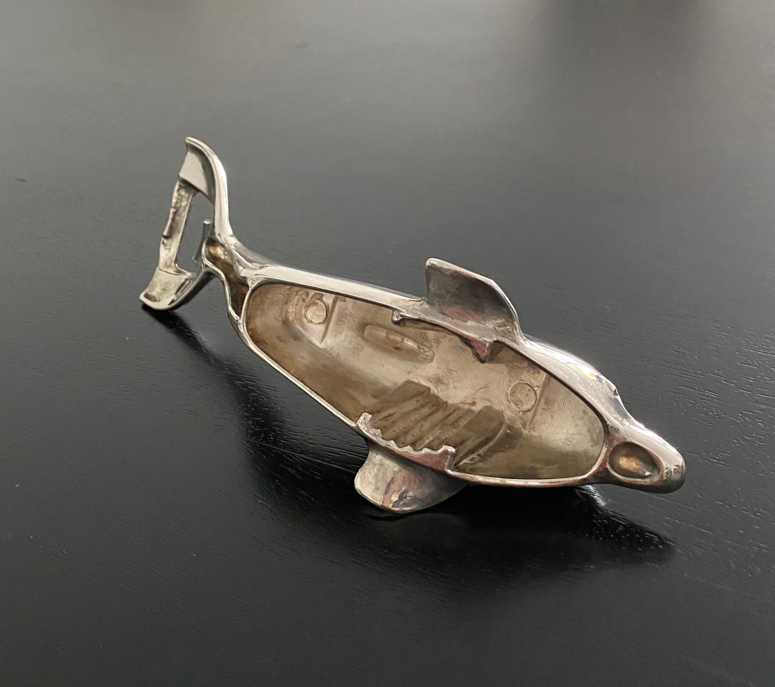 Bottle opener dolphin shape