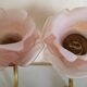 Pair of bronze swan and pink tulip wall lights in glass paste
