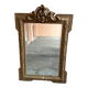 Napoleon-style mirror with a pediment