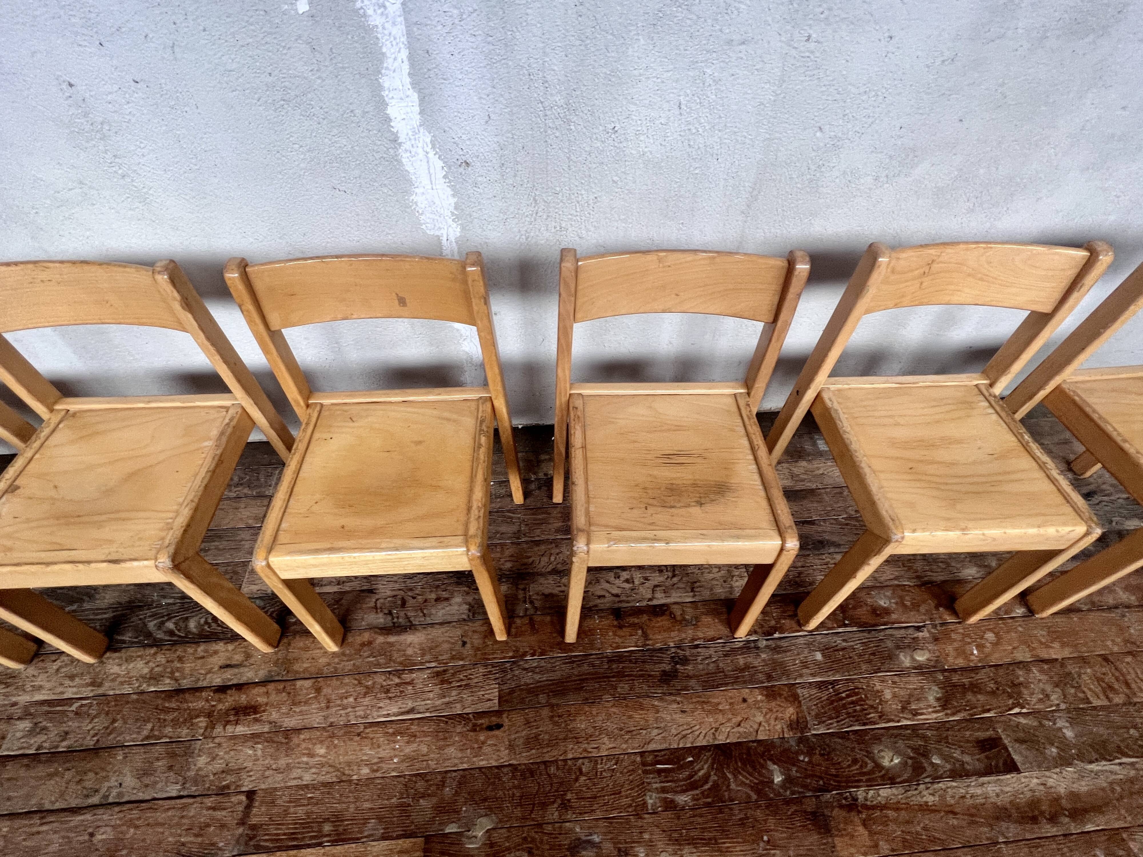 Series of 7 vintage Scandinavian bohemian wooden children's chairs