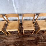 Series of 7 vintage Scandinavian bohemian wooden children's chairs