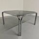 Space coffee table from the 70s, tubular metal and vintage smoked glass
