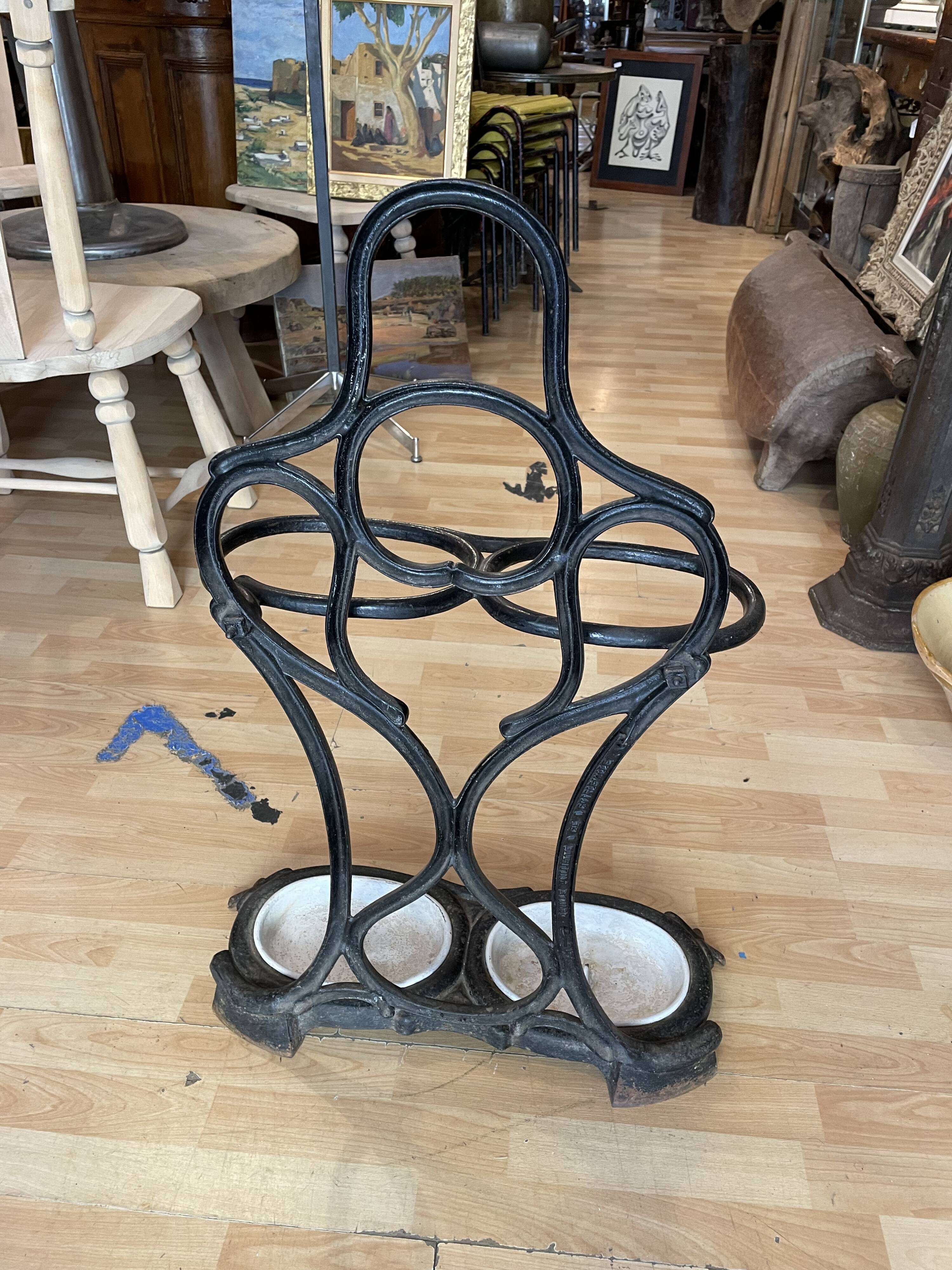 Umbrella holder and cane holder