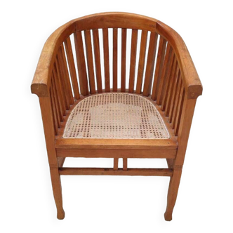 Old vintage teak wood cane armchair