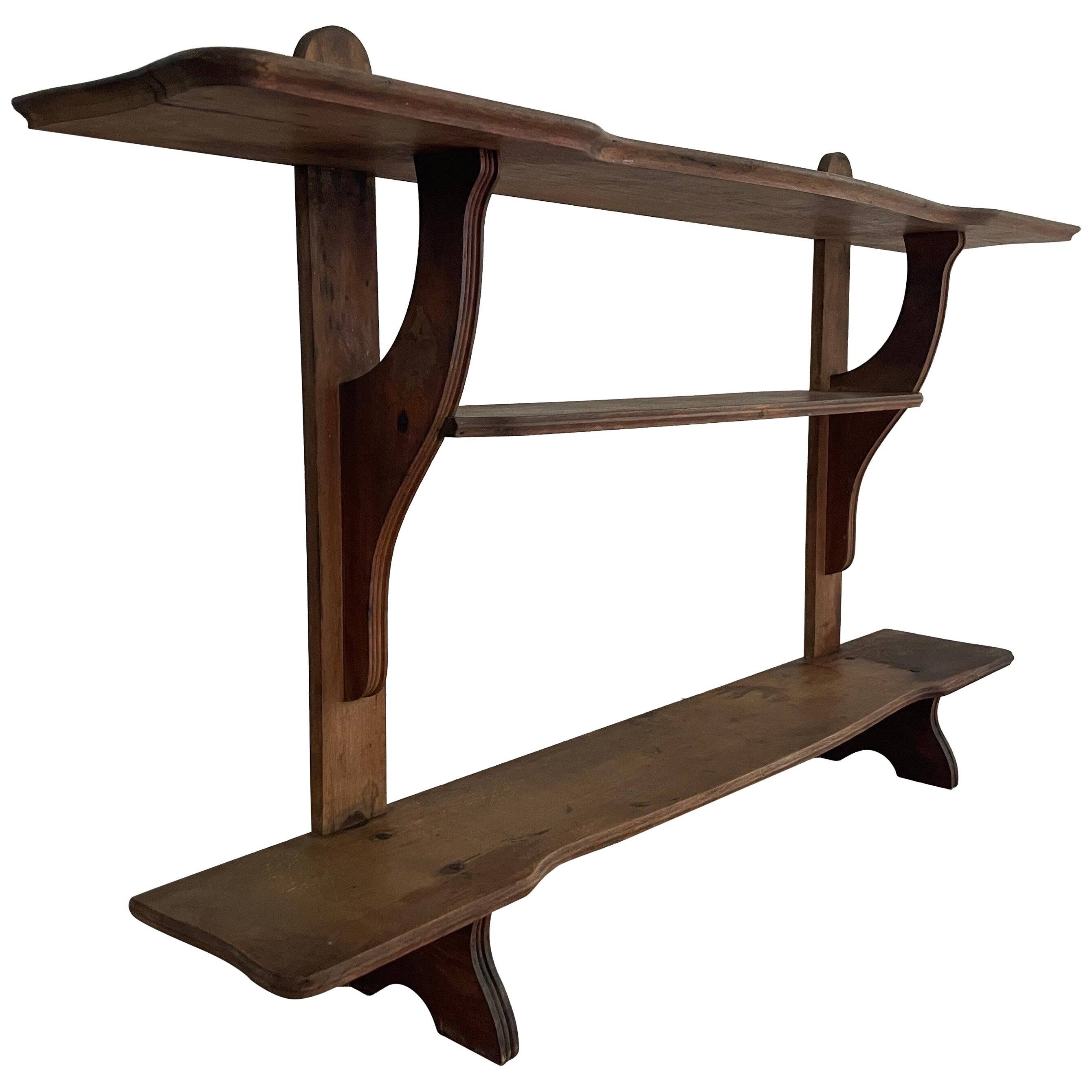 Art Deco wall shelf in wood with three levels, 1940s, Italy.