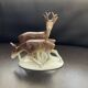 Figurine en porcelaine biche et cerf