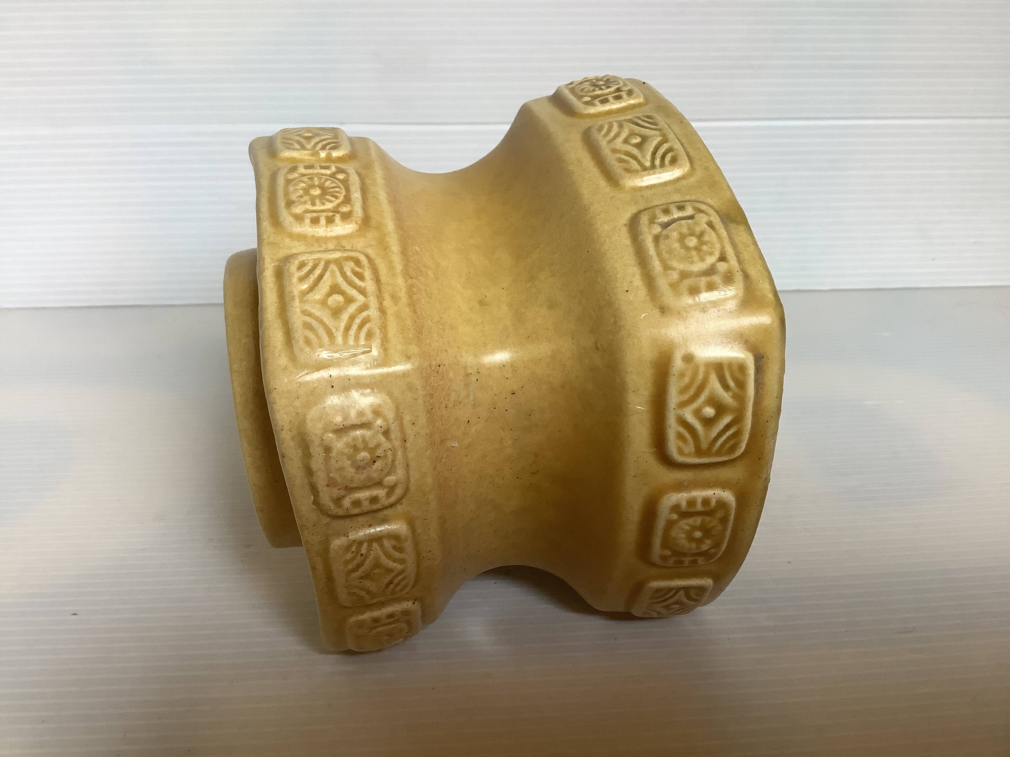 Ochre ceramic geometric-shaped candlestick