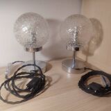 Duo of lamps in textured globe with a great play of light.