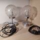 Duo of textured globe lamps with a large play of light.
