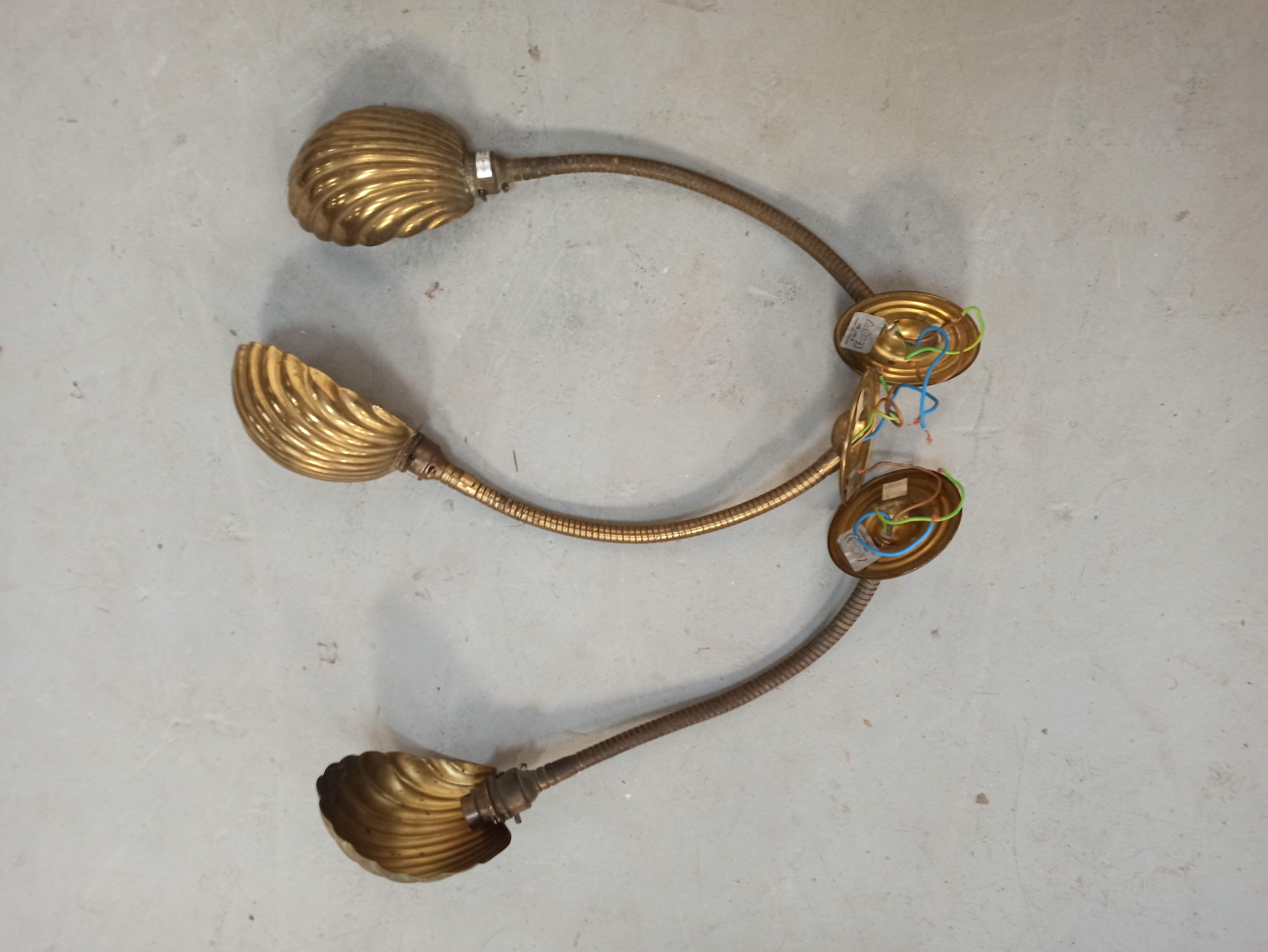 Trio of wall lamps Christopher Wray applies articulated lamp shell