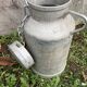 Pair of farm milk jars aluminum cans