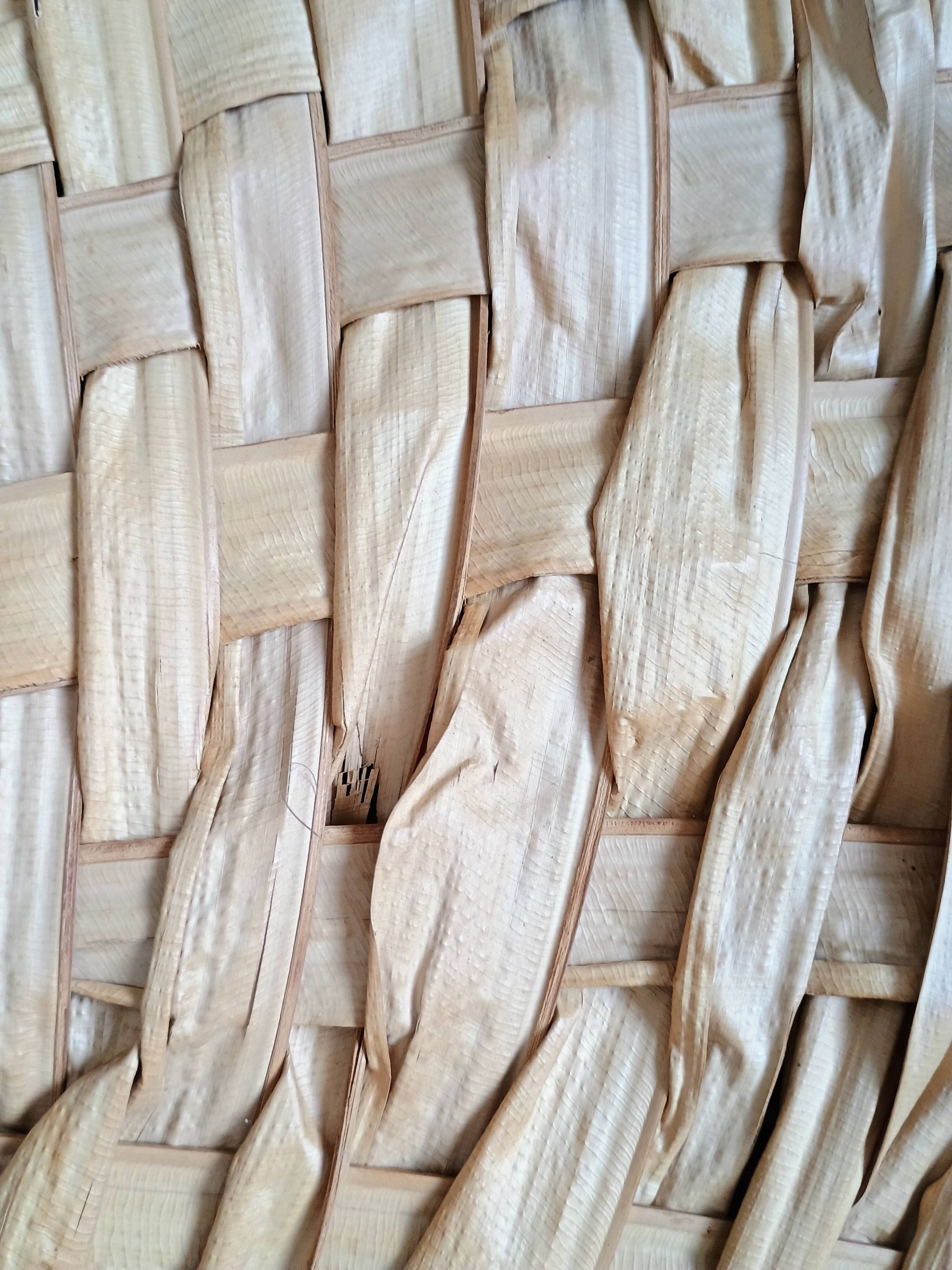 Heart fan in vintage woven palm leaves
