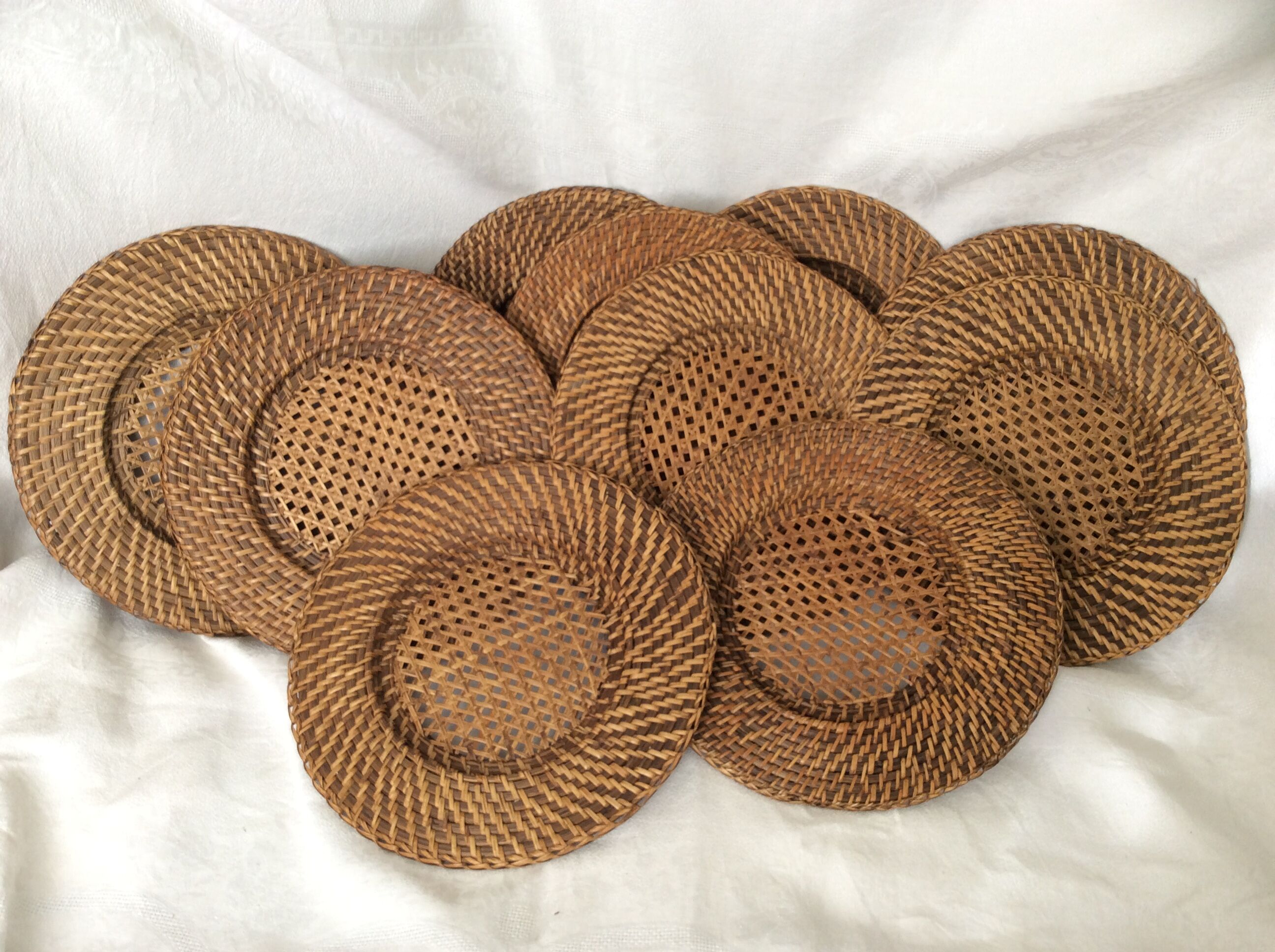 Ten rattan plates, basketry, wicker